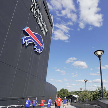 Fans head towards an entrance to watch he Return of the Blue and Red practice at the Buffalo Bills Highmark Stadium 