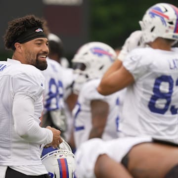 Buffalo Bills wide receiver Khalil Shakir smiles at teammates as he heads to an area to participate in stretches during Bills Training Camp at St. John Fisher University in Pittsford on July 31, 2025.