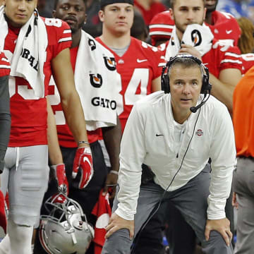 Ohio State Buckeyes head coach Urban Meyer watches his team during a punt return against Northwestern Wildcats during the 2nd quarter in the Big Ten Championship game in Indianapolis, Ind on December 1, 2018.  [Kyle Robertson/Dispatch]