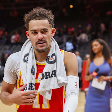 Dec 18, 2023; Atlanta, Georgia, USA; Atlanta Hawks guard Trae Young (11) walks off the court after a victory against the Detroit Pistons at State Farm Arena. Mandatory Credit: Brett Davis-Imagn Images 