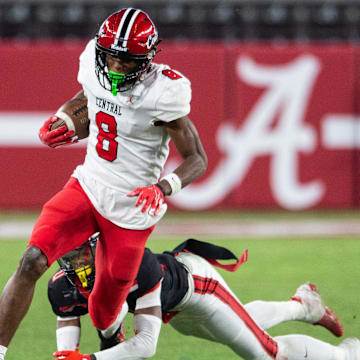 Central Phenix City's Cameron Coleman (8) breaks free for a touchdown after a catch as Central Phenix City faces Thompson in the Class 7A football state championship at Bryant-Denny Stadium in Tuscaloosa, Ala., on Wednesday, Dec. 6, 2023. Central Phenix City defeated Thompson 21-19.