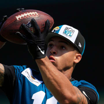 Jacksonville Jaguars wide receiver Parker Washington (11) catches a pass during an organized team activity Tuesday, May 28, 2024 at EverBank Stadium’s Miller Electric Center in Jacksonville, Fla.