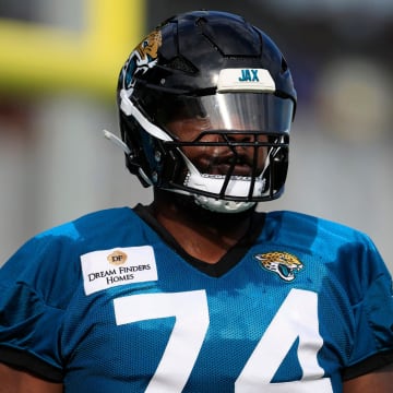 Jacksonville Jaguars offensive tackle Cam Robinson (74) looks on during the third day of an NFL football training camp practice Friday, July 26, 2024 at EverBank Stadium’s Miller Electric Center in Jacksonville, Fla.