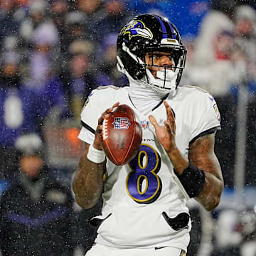 Baltimore Ravens quarterback Lamar Jackson gets ready to launch the ball during first half action at the Buffalo Bills divisional game against the Baltimore Ravens at Highmark Stadium in Orchard Park on Jan. 19, 2025.