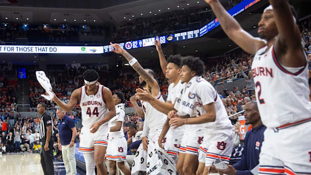 Auburn Tigers bench reacts to final points of the game as Auburn Tigers take on Missouri Tigers 