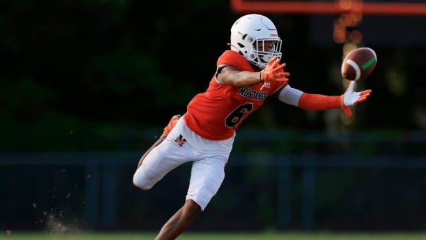 A pass intended for Mandarin's Will Jones (6) is out of reach during the second quarter of a high school football matchup Thu