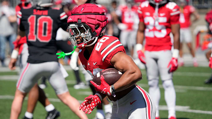 Ohio State Buckeye James Peoples (20) carries the ball during warm ups before the start of the spring game at Ohio Stadium on April 12, 2025.