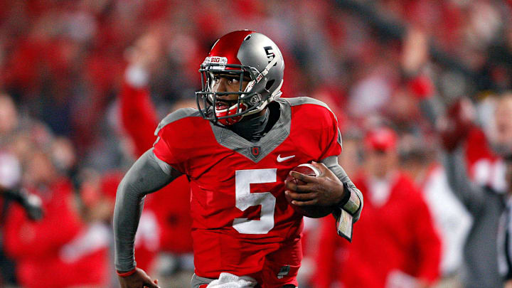 Ohio State Buckeyes quarterback Braxton Miller (5) scores a touchdown against Wisconsin Badgers in the fourth quarter of their NCAA football game at Ohio Stadium in Columbus, Ohio, October 29, 2011. (Dispatch photo by Kyle Robertson)

Osu11wis Kr 13