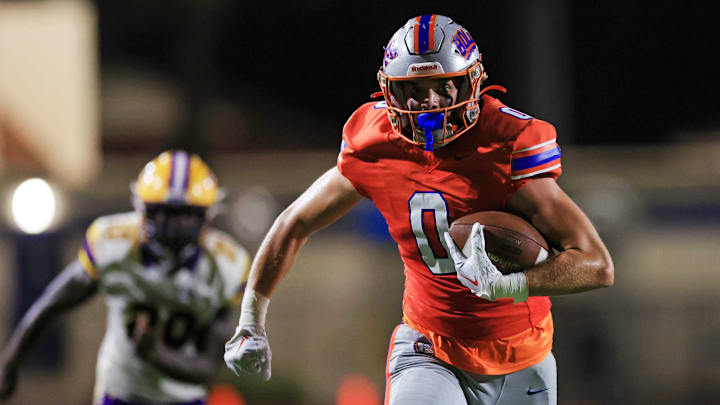 Bolles' Corbyn Fordham (0) scores a catch and run touchdown during the second quarter of a high school football game Friday, Oct. 4, 2024 at The Bolles School in Jacksonville, Fla. The Bolles Bulldogs defeated the Columbia Tigers 42-17.