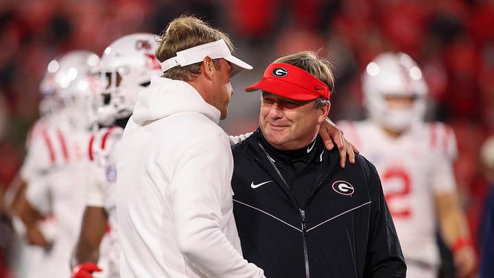 Nov 11, 2023; Athens, Georgia, USA; Mississippi Rebels head coach Lane Kiffin talks to Georgia Bulldogs head coach Kirby Smart before a game at Sanford Stadium. Mandatory Credit: Brett Davis-Imagn Images