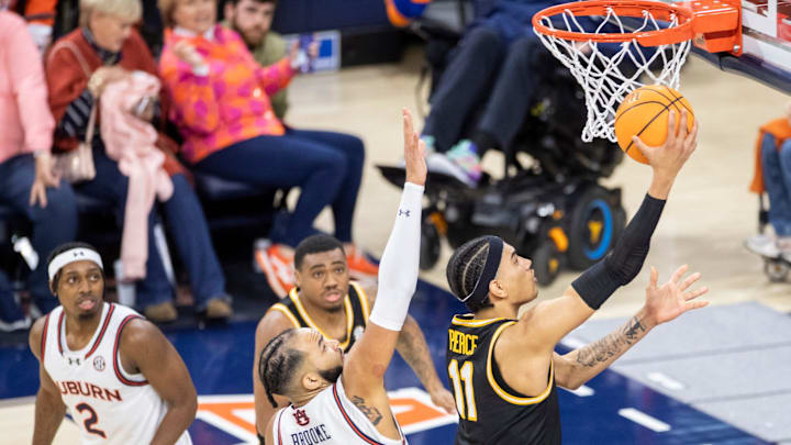 Missouri Tigers forward Trent Pierce (11) goes up for a layup as Auburn Tigers take on Missouri Tigers at Neville Arena in Auburn, Ala., on Saturday, Jan. 4, 2025. Auburn Tigers defeated Missouri Tigers 84-68.