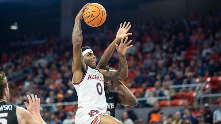 Auburn Tigers guard K.D. Johnson (0) goes up for a layup as Auburn Tigers take on Pennsylvania