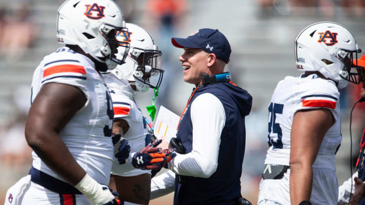 Auburn Tigers defensive coordinator DJ Durkin celebrates a stop with his team during the A-Day spring game at Jordan-Hare Stadium in Auburn, Ala., on Saturday, April 6, 2024.