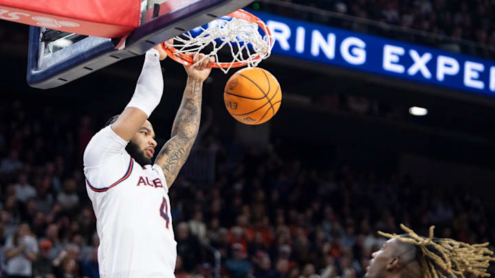 Auburn Tigers forward Johni Broome (4) dunks the ball as Auburn Tigers take on Tennessee Volunteers at Neville Arena in Auburn, Ala., on Saturday, Jan. 25, 2025. Auburn Tigers defeated Tennessee Volunteers 53-51.