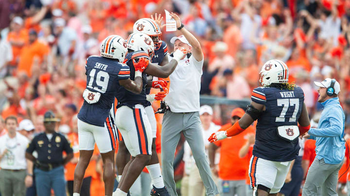 Auburn Tigers defensive coordinator DJ Durkin celebrates a sack with his defense as Auburn Tigers take on Oklahoma Sooners at Jordan-Hare Stadium in Auburn, Ala., on Saturday, Sept. 28, 2024. Oklahoma Sooners defeated Auburn Tigers 27-21.