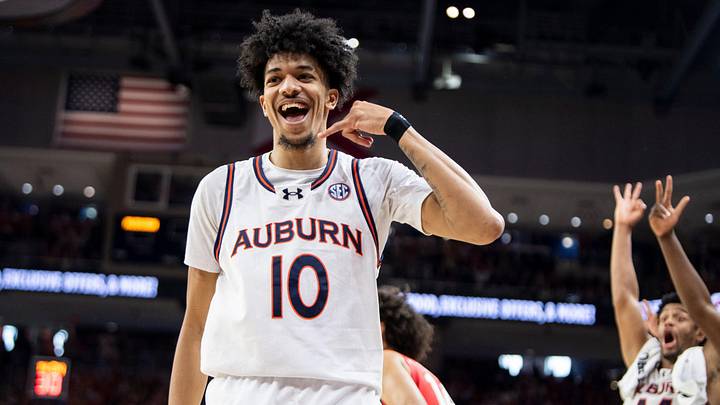 Auburn Tigers forward Chad Baker-Mazara (10) celebrates his three-pointer as Auburn Tigers take on Georgia Bulldogs at Neville Arena in Auburn, Ala., on Saturday, Feb. 22, 2025. Auburn Tigers defeated Georgia Bulldogs 82-70.