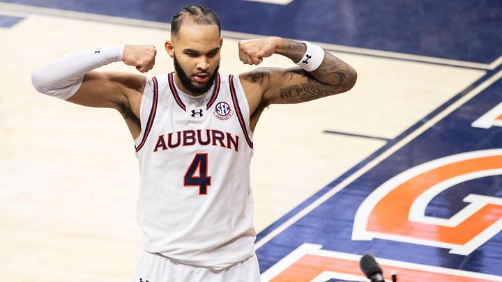 Auburn Tigers forward Johni Broome (4) celebrates an and-one play as Auburn Tigers take on Missouri Tigers at Neville Arena in Auburn, Ala., on Saturday, Jan. 4, 2025. Auburn Tigers defeated Missouri Tigers 84-68.