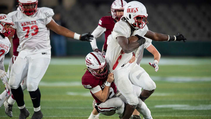 Wadley's Jaquez Wilkes (6) returns his interception during the Class 1A football state championship at Protective Stadium in Birmingham, Ala., on Thursday, Dec. 5, 2024. Wadley defeated Maplesville 37-7.
