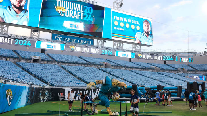 Young fans putt during the Duuuval Draft Party Thursday, April 25, 2024 at EverBank Stadium in