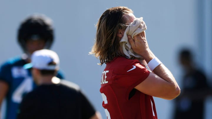 Jacksonville Jaguars quarterback Trevor Lawrence (16) wins sweat off his face during the first day of an NFL football training camp practice Wednesday, July 24, 2024 at EverBank Stadium’s Miller Electric Center in Jacksonville, Fla.