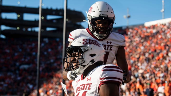 New Mexico State Aggies wide receiver Kordell David (11) celebrates his touchdown reception during the first quarter as Auburn Tigers take on New Mexico State Aggies at Jordan-Hare Stadium in Auburn, Ala., on Saturday, Nov. 18, 2023.