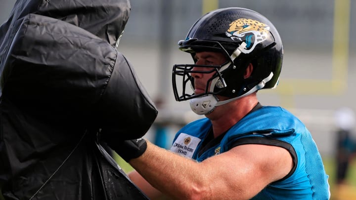 Jacksonville Jaguars offensive tackle Walker Little (72) hits a sled during the third day of an NFL football training camp practice Friday, July 26, 2024 at EverBank Stadium’s Miller Electric Center in Jacksonville, Fla.