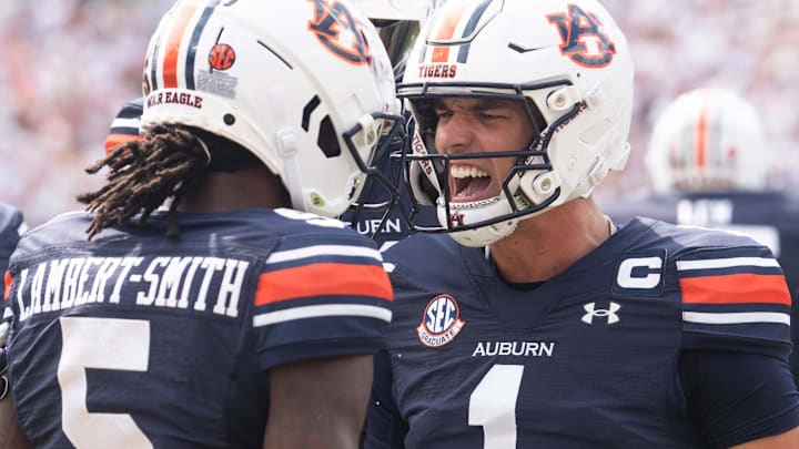 Auburn Tigers wide receiver KeAndre Lambert-Smith (5) and quarterback Payton Thorne (1) celebrate their touchdown vs. the  California Golden Bears.