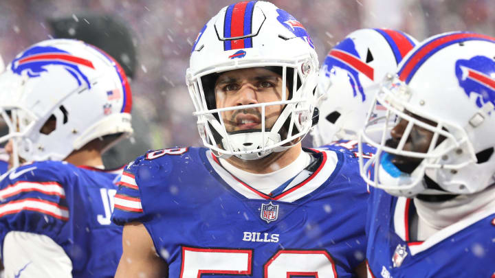 Buffalo Bills Matt Milano makes a face as he watches the action on the large screen hanging over the field.  The Bills hosted the Cincinnati Bengals in their division playoff game and lost, Jan. 22, 2023.

Bills Matt Milano