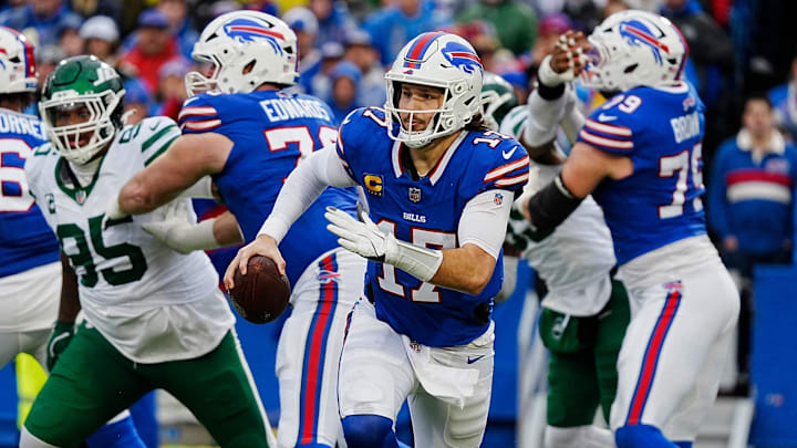 Buffalo Bills quarterback Josh Allen (17) runs with the ball for a gain of about eight-yards during first half action at the Bills home game against the New York Jets at Highmark Stadium in Orchard Park on Dec. 29, 2024. Buffalo Bills quarterback Josh Allen (17) runs with the ball for a gain of about eight-yards during first half action at the Bills home game against the New York Jets at Highmark Stadium in Orchard Park on Dec. 29, 2024.