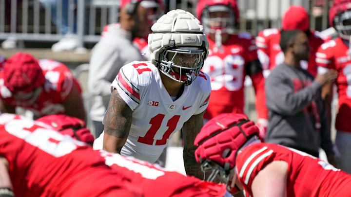 Ohio State Buckeye Gary C.J. Hicks (11) lines up on the defensive line against the Scarlet team during the spring game at Ohio Stadium on April 12, 2025. Ohio State Buckeye Gary C.J. Hicks (11) lines up on the defensive line against the Scarlet team during the spring game at Ohio Stadium on April 12, 2025.