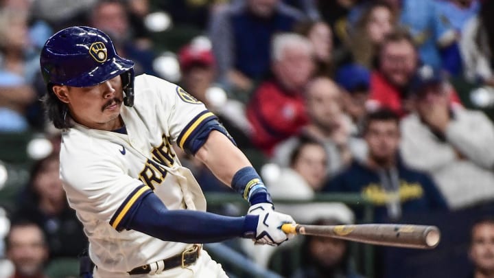 Milwaukee Brewers designated hitter Keston Hiura (18) hits an RBI double in the sixth inning against the St. Louis Cardinals at American Family Field in 2022.