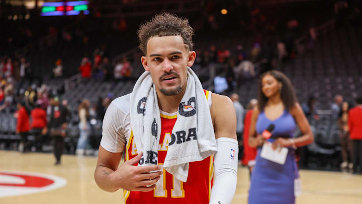 Dec 18, 2023; Atlanta, Georgia, USA; Atlanta Hawks guard Trae Young (11) walks off the court after a victory against the Detroit Pistons at State Farm Arena. Mandatory Credit: Brett Davis-Imagn Images 