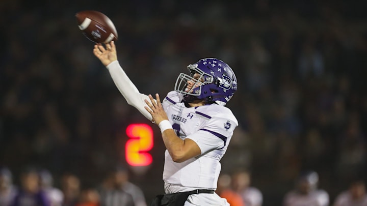 Boerne's Jaxon Baize (9) throws a pass in a Class 4A Division I regional final high school football game against Calallen at Alamo Stadium on Friday, Dec. 2, 2022 in San Antonio, Texas. The Greyhounds won 49-19.