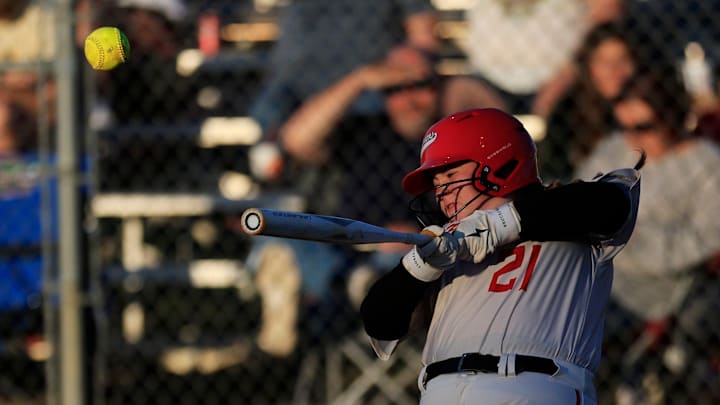 Middleburg's Emma Ward (21) connects at bat during the fourth inning of a regular season high school softball matchup Tuesday, April 23, 2024 at Baker County High School in Glen St. Mary, Fla. The Baker County Wildcats defeated the Middleburg Broncos 6-3. Middleburg's Emma Ward (21) connects at bat during the fourth inning of a regular season high school softball matchup Tuesday, April 23, 2024 at Baker County High School in Glen St. Mary, Fla. The Baker County Wildcats defeated the Middleburg Broncos 6-3.