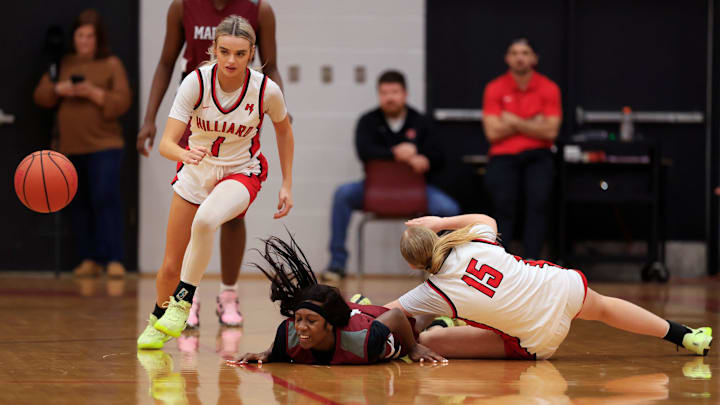 Madison County's Tahj Dobson (5), center, loses the ball against Hilliard's Alyssa Hallman (15), right, as Molly Dean (1) looks on during the third quarter of an FHSAA Region 3-Rural high school girls basketball semifinal Thursday, Feb. 13, 2025 at Hilliard Middle-Senior High School in Hilliard, Fla. Hilliard defeated Madison County 65-39. Madison County's Tahj Dobson (5), center, loses the ball against Hilliard's Alyssa Hallman (15), right, as Molly Dean (1) looks on during the third quarter of an FHSAA Region 3-Rural high school girls basketball semifinal Thursday, Feb. 13, 2025 at Hilliard Middle-Senior High School in Hilliard, Fla. Hilliard defeated Madison County 65-39.