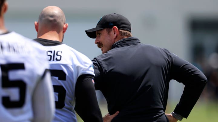 Jacksonville Jaguars defensive coordinator Ryan Nielsen talks with defensive end Adam Gotsis (96) during an organized team activity Tuesday, May 28, 2024 at EverBank Stadium’s Miller Electric Center in Jacksonville, Fla.
