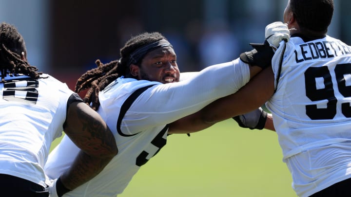 Jacksonville Jaguars defensive tackle DaVon Hamilton (52) practices against defensive end Jeremiah Ledbetter (99) during an organized team activity Tuesday, May 28, 2024 at EverBank Stadium’s Miller Electric Center in Jacksonville, Fla.