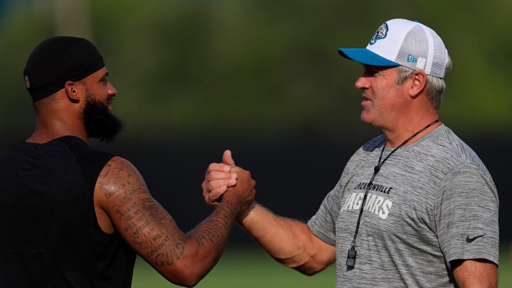 Jacksonville Jaguars wide receiver Gabe Davis (0), left, and head coach Doug Pederson greet before practice during the seventh day of an NFL football training camp practice Wednesday, July 31, 2024 at EverBank Stadium’s Miller Electric Center in Jacksonville, Fla.