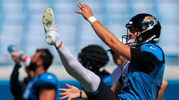 Jacksonville Jaguars punter Logan Cooke (9) follows his punt during the ninth day of an NFL football training camp practice Saturday, Aug. 3, 2024 at EverBank Stadium in Jacksonville, Fla. Today marked the first day of public practice inside the stadium.