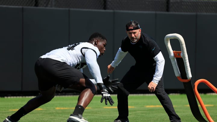 Jacksonville Jaguars outside linebackers coach Bill Shuey coaches linebacker DJ Coleman (54) during an organized team activity Tuesday, May 28, 2024 at EverBank Stadium’s Miller Electric Center in Jacksonville, Fla.