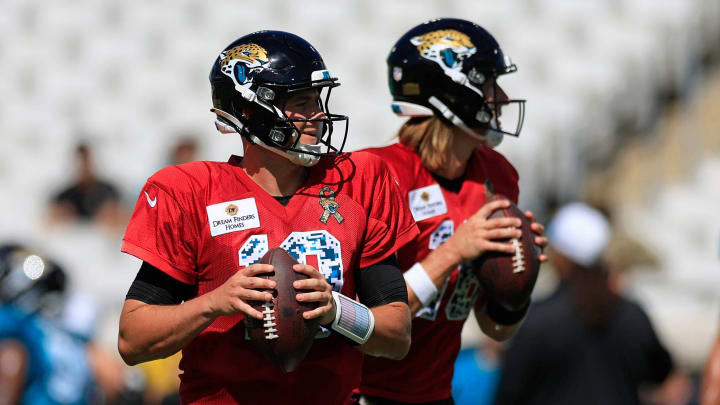 Jacksonville Jaguars quarterback Mac Jones (10) looks to pass next to quarterback Trevor Lawrence (16) during the ninth day of an NFL football training camp practice Saturday, Aug. 3, 2024 at EverBank Stadium in Jacksonville, Fla. Today marked the first day of public practice inside the stadium.