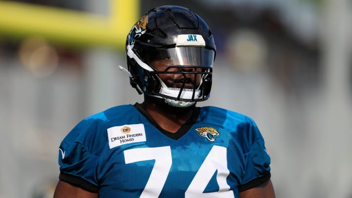 Jacksonville Jaguars offensive tackle Cam Robinson (74) looks on during the third day of an NFL football training camp practice Friday, July 26, 2024 at EverBank Stadium’s Miller Electric Center in Jacksonville, Fla.