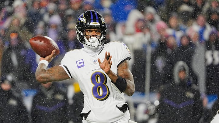 Baltimore Ravens quarterback Lamar Jackson gets off a pass during first half action during the Buffalo Bills divisional game against the Baltimore Ravens at Highmark Stadium in Orchard Park on Jan. 19, 2025. Baltimore Ravens quarterback Lamar Jackson gets off a pass during first half action during the Buffalo Bills divisional game against the Baltimore Ravens at Highmark Stadium in Orchard Park on Jan. 19, 2025.