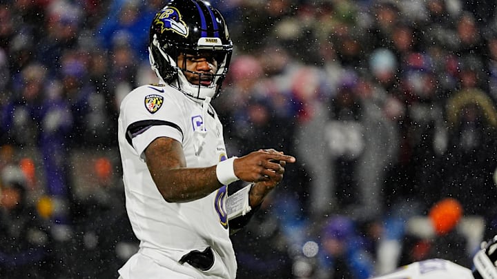 Baltimore Ravens quarterback Lamar Jackson directs his teammates before the snap during first half action at the Buffalo Bills divisional game against the Baltimore Ravens at Highmark Stadium in Orchard Park on Jan. 19, 2025.