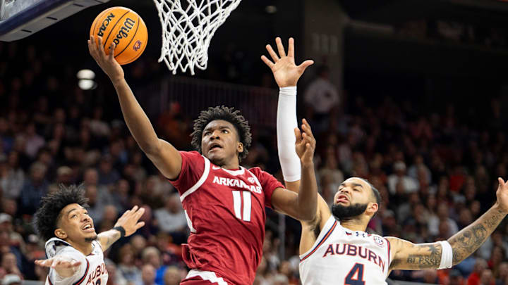Arkansas Razorbacks forward Karter Knox (11) goes up for a layup as Auburn Tigers take on Arkansas Razorbacks at Neville Arena in Auburn, Ala., on Wednesday, Feb. 19, 2025. Auburn Tigers lead Arkansas Razorbacks 33-27 at halftime.