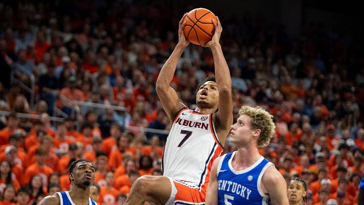 Auburn Tigers forward Keyshawn Hall (7) goes up for a layup as Auburn Tigers take on Kentucky Wildcats at Neville Arena in Auburn, Ala. on Saturday, Feb. 21, 2026. Auburn Tigers defeated Kentucky Wildcats 75-74.