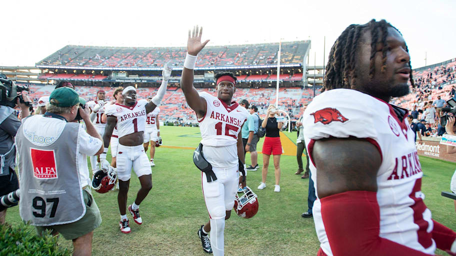 Arkansas Razorbacks quarterback KJ Jackson acknowledges fans as he walks off the field after game vs. Auburn.
