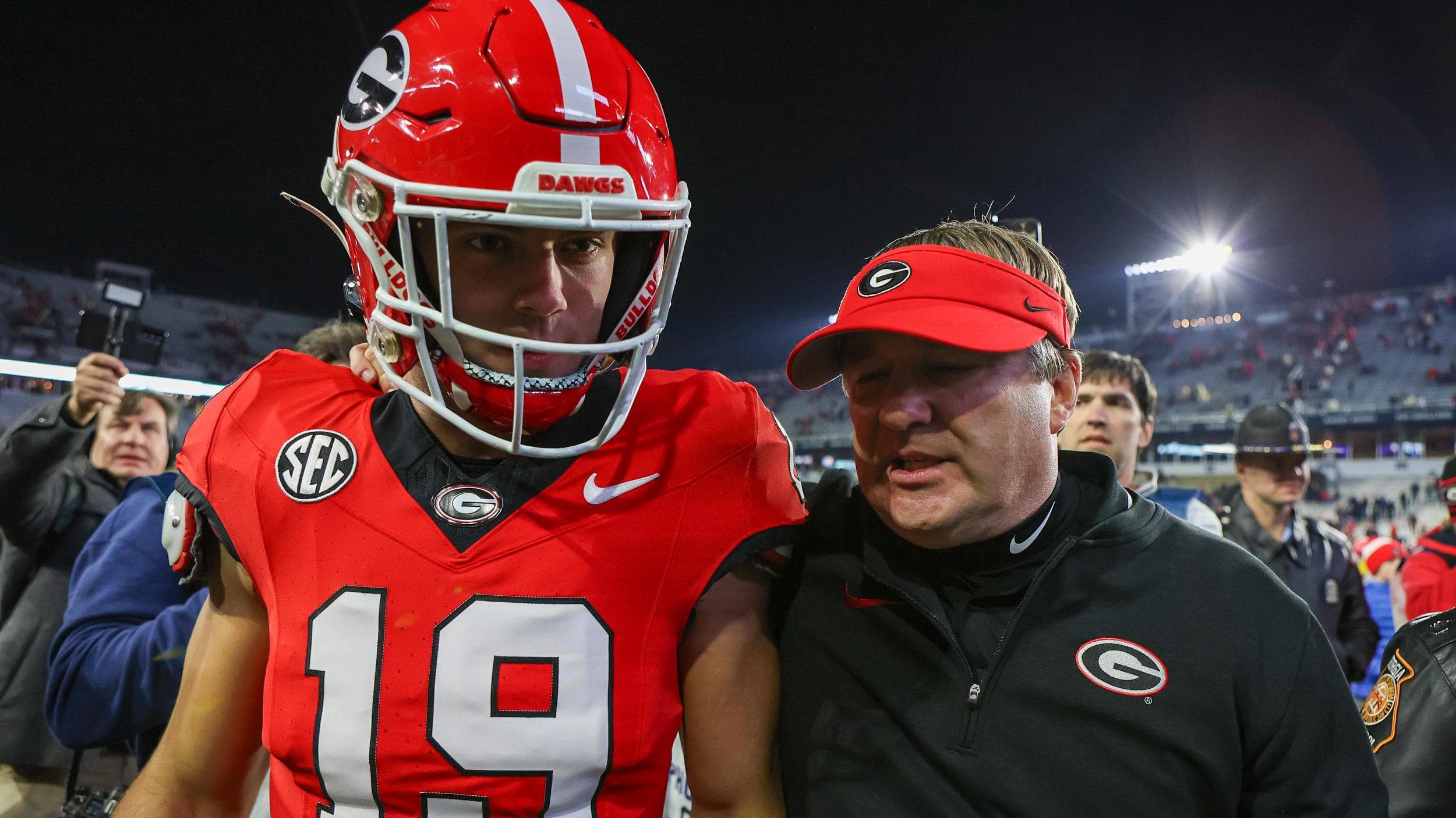 Nov 25, 2023; Atlanta, Georgia, USA; Georgia Bulldogs tight end Brock Bowers (19) and head coach