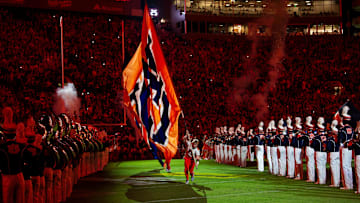 Auburn cheerleaders lead out their team as Auburn Tigers take on Missouri Tigers at Jordan-Hare Stadium in Auburn, Ala. on Saturday, Oct. 18, 2025. Missouri Tigers defeated the Auburn Tigers 23-17 in 2OT.