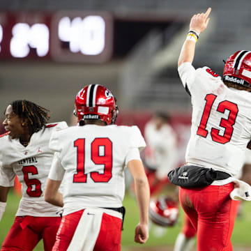 Central Phenix City's Andrew Alford (13) celebrates with his team as Central Phenix City faces Thompson in the Class 7A football state championship at Bryant-Denny Stadium in Tuscaloosa, Ala., on Wednesday, Dec. 6, 2023.